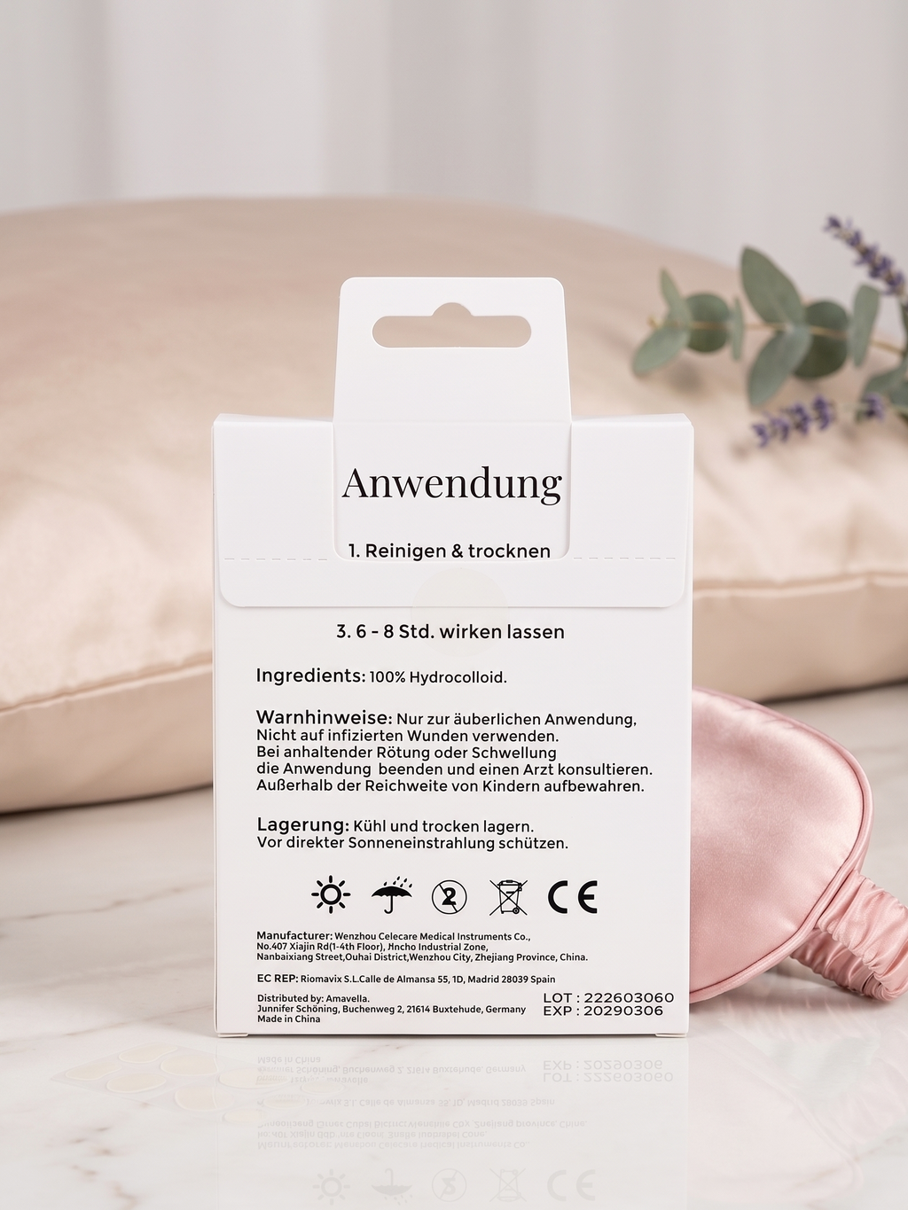 Rückseite der Amavella Hydrocolloid Acne Patches Verpackung mit Anwendungshinweisen und Inhaltsstoffen.