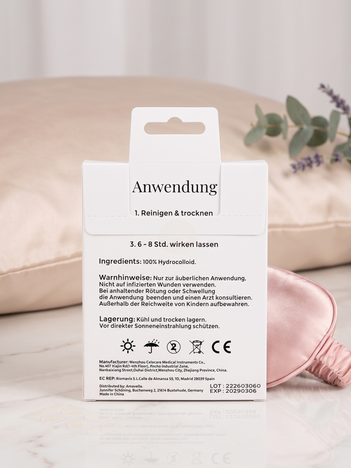 Rückseite der Amavella Hydrocolloid Acne Patches Verpackung mit Anwendungshinweisen und Inhaltsstoffen.